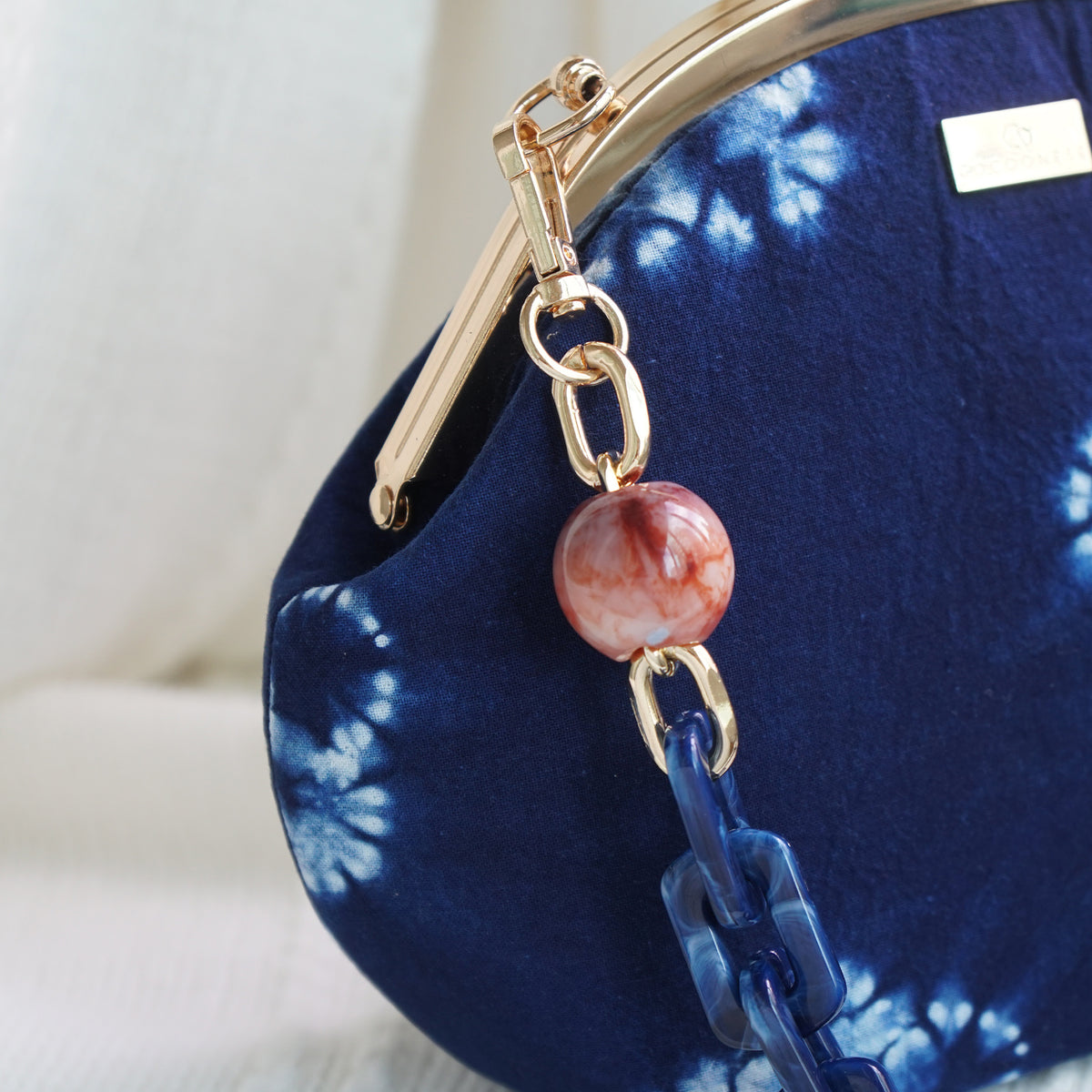 Acrylic Chain Handle Clasp Sling Bag - Indigo Eclipse
